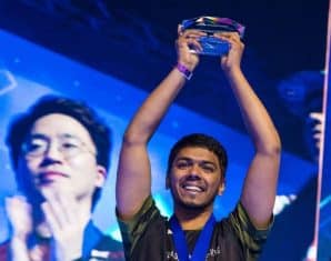 Arslan Ash celebrates winning a title