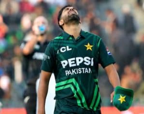 Haris Rauf walking away after an injury