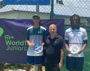 Mikaeel Ali Baig with an ITF junior trophy after his win in Jamaica