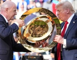 Donald Trump with the Club World Cup trophy which was handed to Chelsea