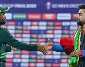 Rashid Khan shakes hands with Babar Azam after a Pakistan Afghanistan match