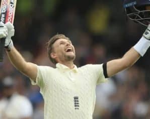 Joe Root celebrates scoring a century during a test series