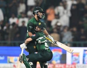 Salman Ali Agha and Mohammad Haris after a game