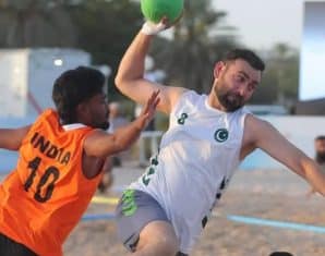 Pakistan and India players during a beach handball match