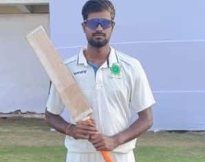 Akash Choudhary poses after hitting 8 sixes in 8 balls