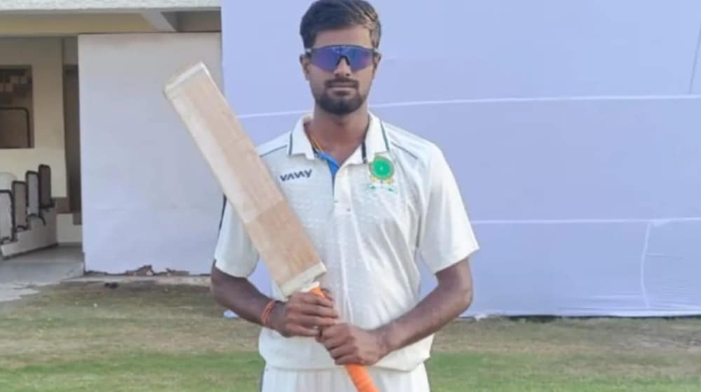 Akash Choudhary poses after hitting 8 sixes in 8 balls