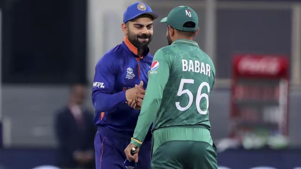 Babar Azam and Kohli shaking hands