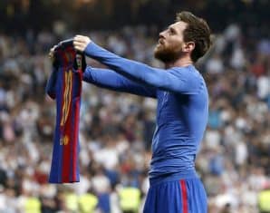 Lionel Messi celebrates after scoring against Real Madrid