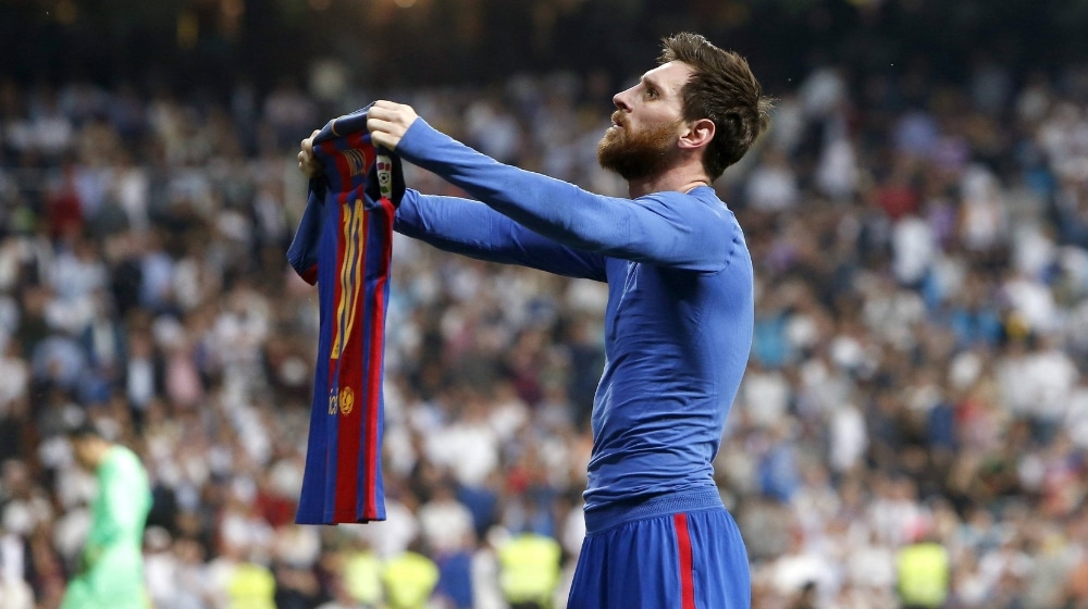Lionel Messi celebrates after scoring against Real Madrid